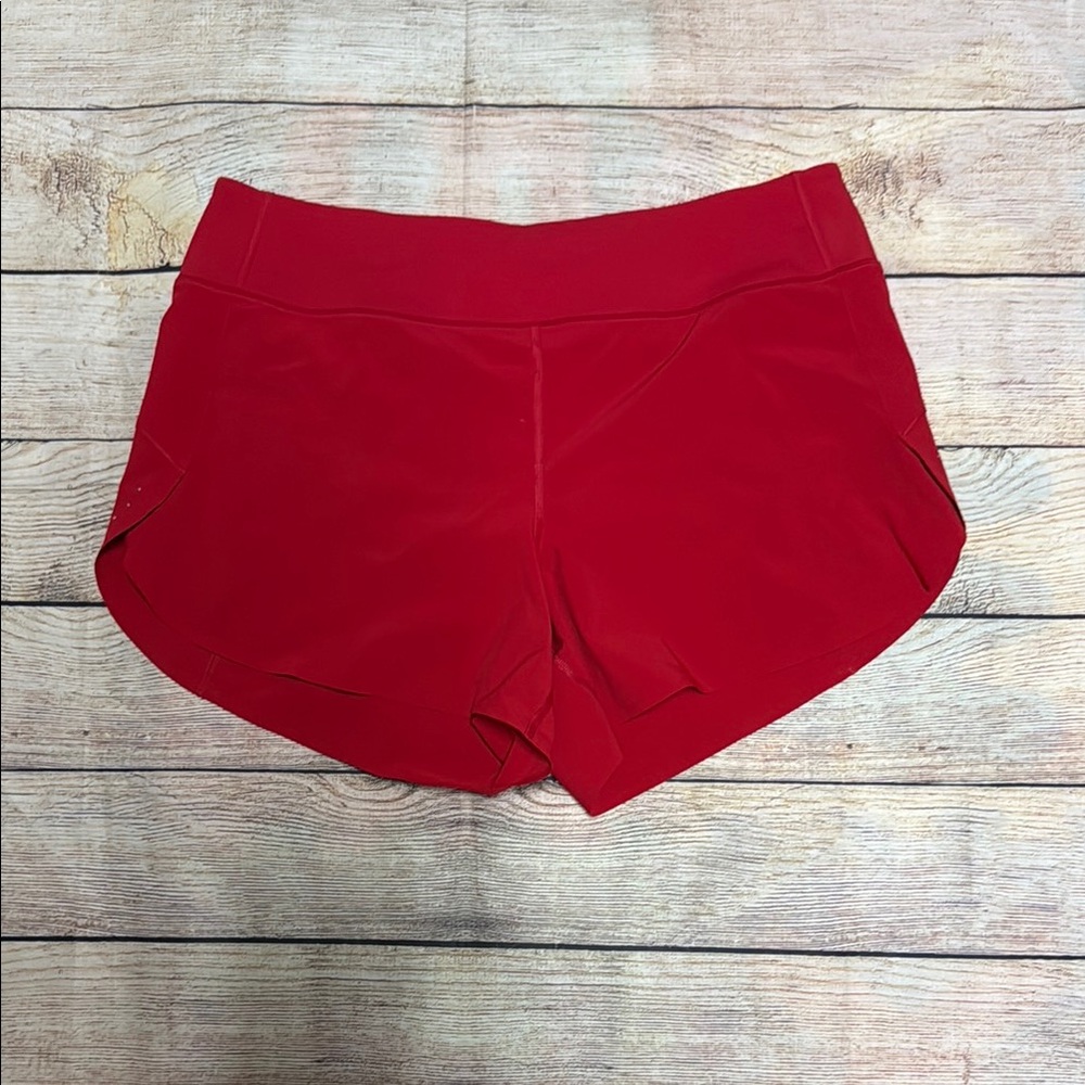 Athleta Red Athletic Shorts with Curved Hem